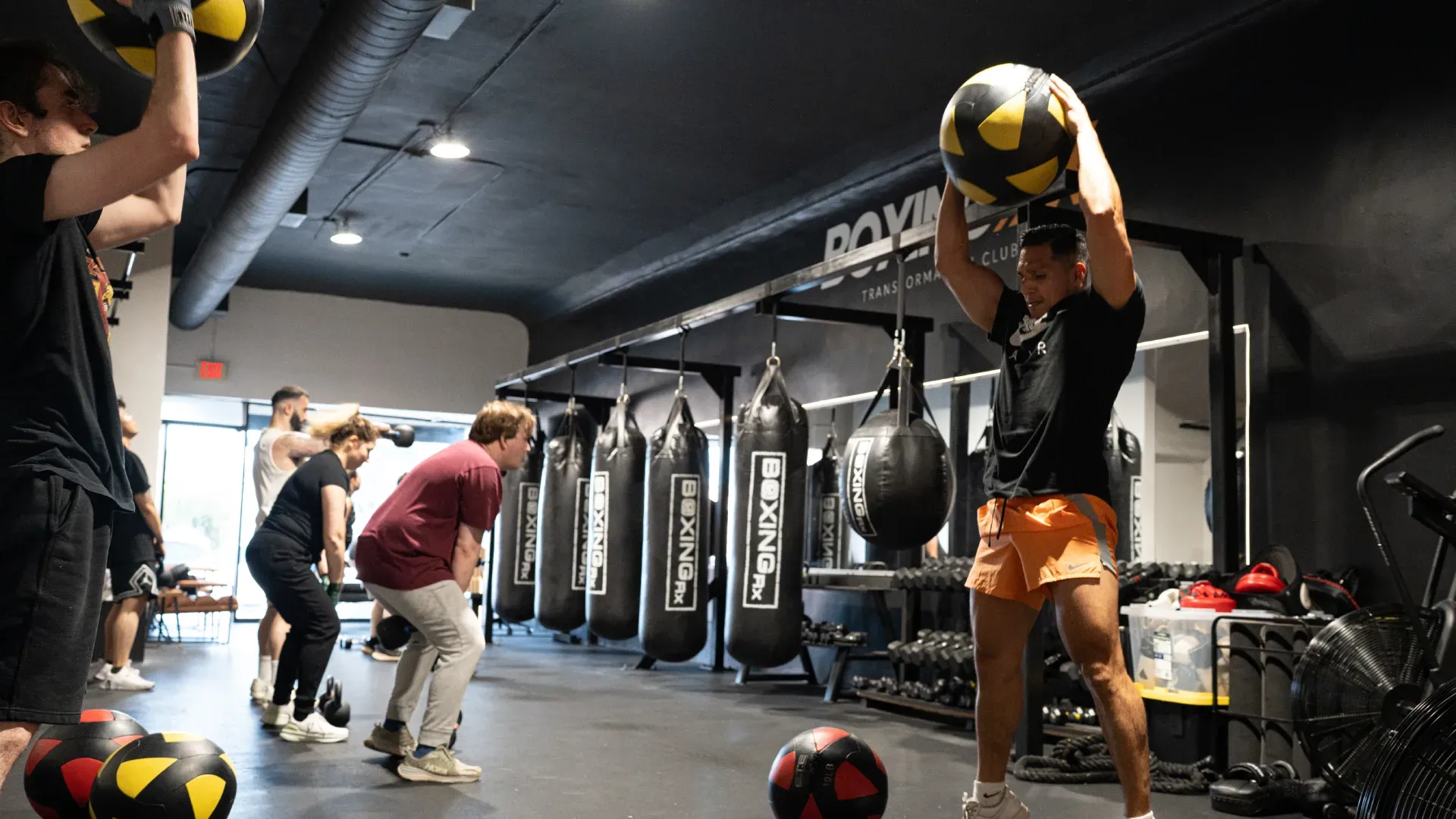 A BoxingRX group class training on the gym floor